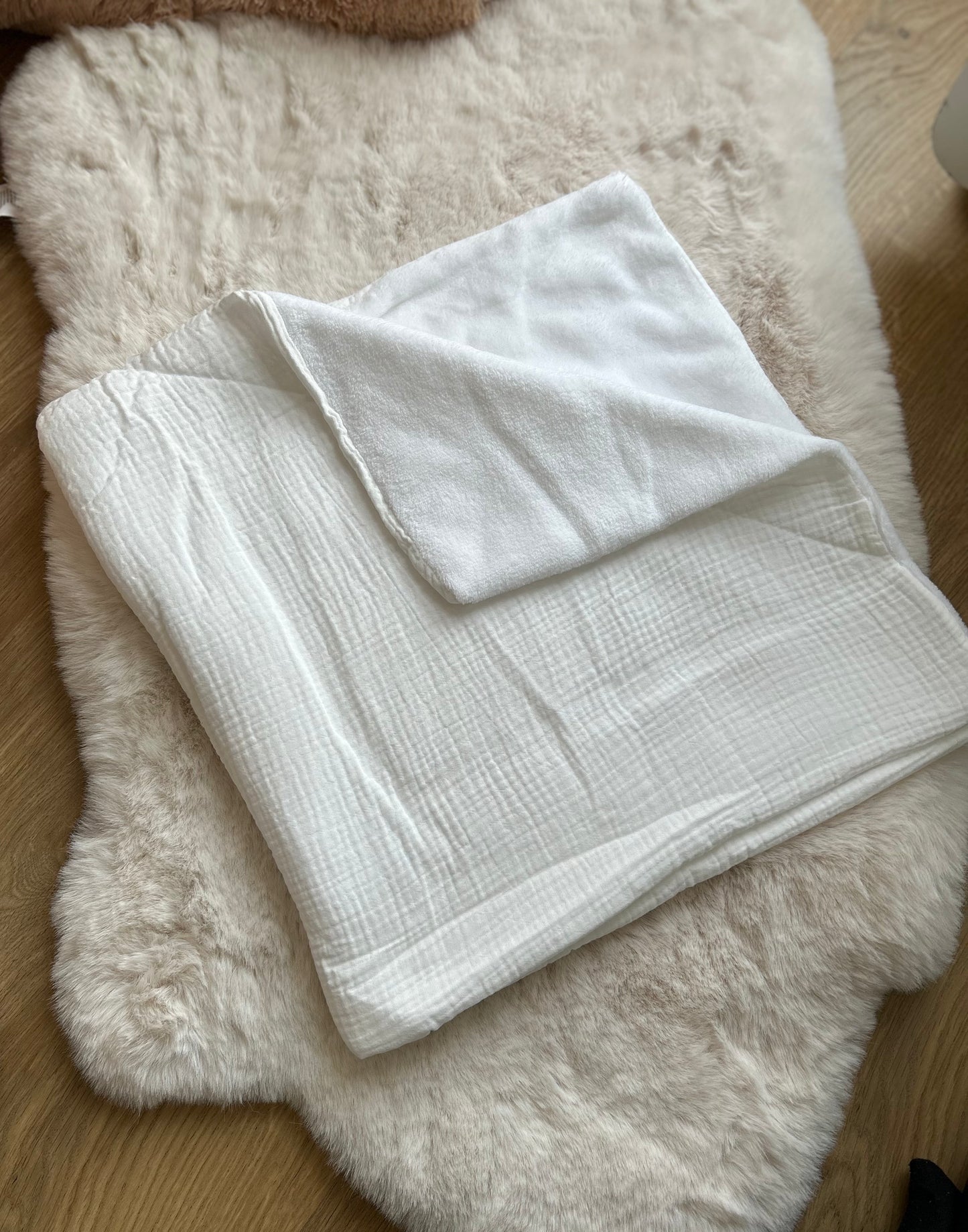 Couverture en gaze de coton et son intérieur polaire