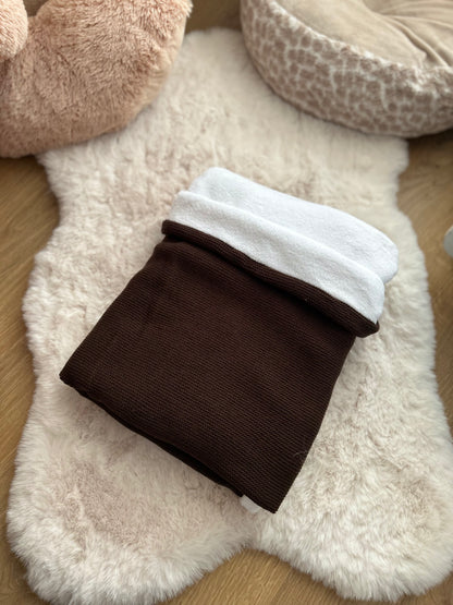 Couverture en maille et son intérieur polaire