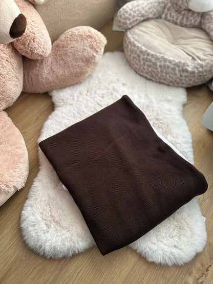 Couverture en maille et son intérieur polaire