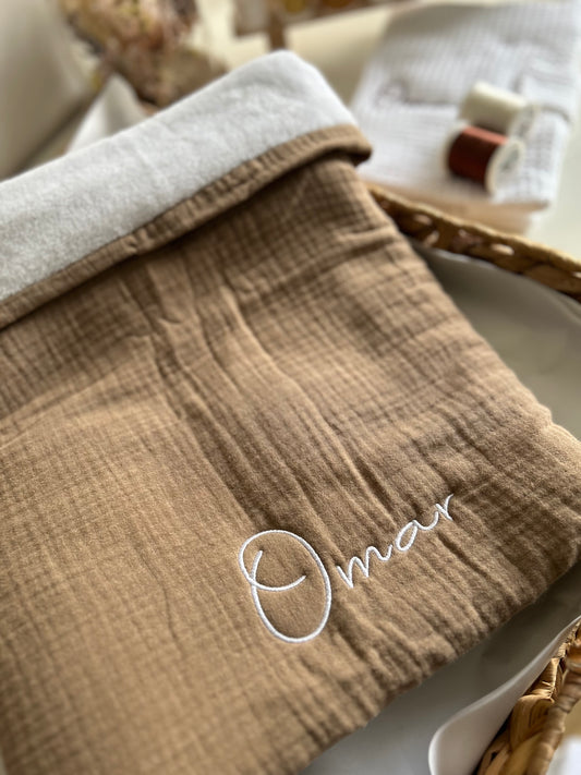 Couverture en gaze de coton et son intérieur polaire